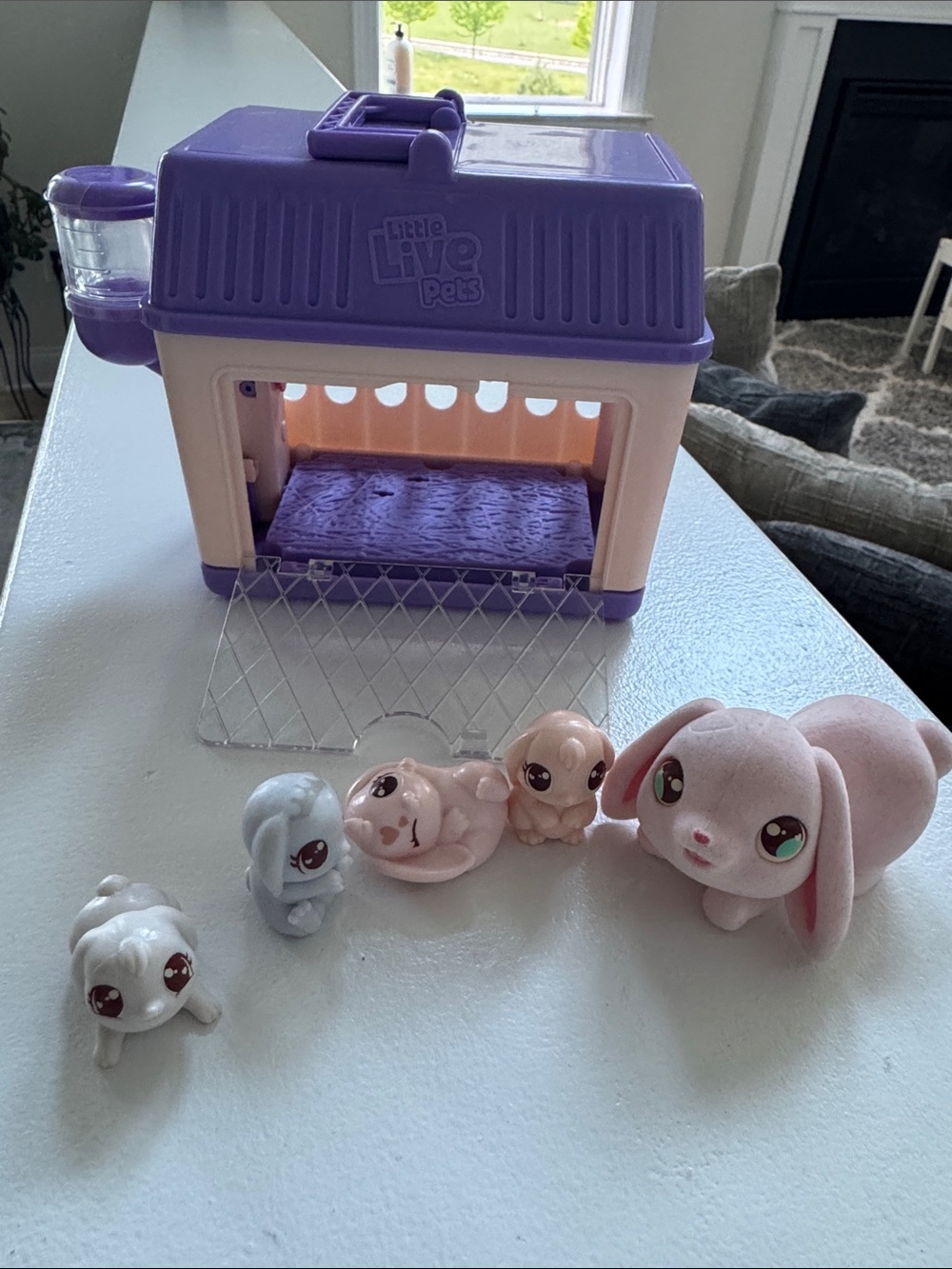 Little Live Pets Bunny Carrier Playset with 4 Mini Figures and Bottle Purple